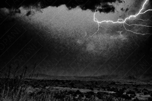 abstract scene of lightning over a landscape at night