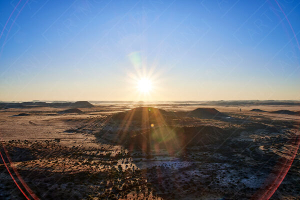 Karoo landscape with a lens flare ring