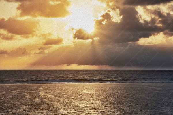 rain over the ocean during golden hour