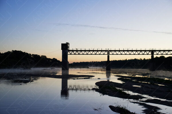 broken train bridge over the Crocodile river in South Africa